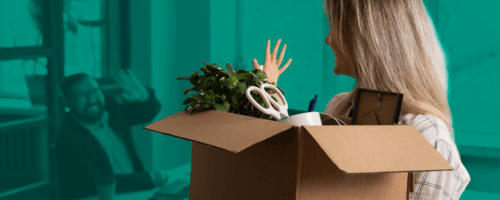 a smiling woman holds a box with office supplies in her hand and with her other hand she waves goodbye to a man in the office